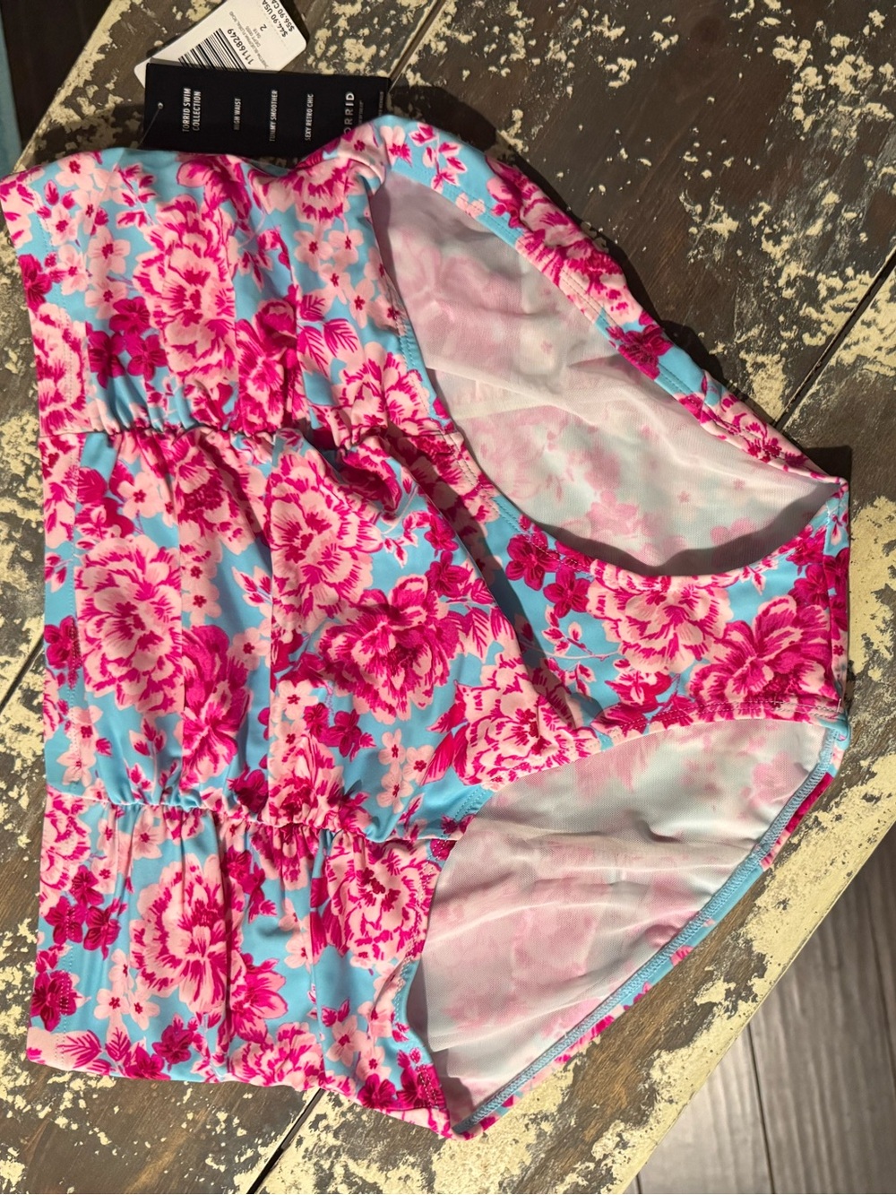 Torrid Pink Floral Swim Shorts on Light Blue
